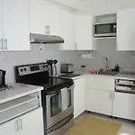 Sunset Arms Apartments