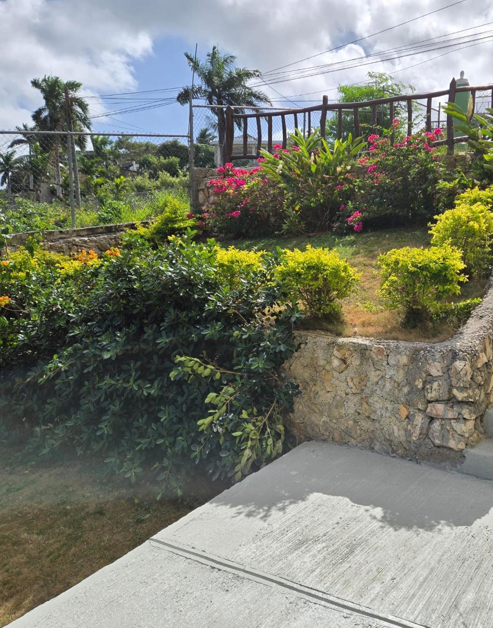 Casa de férias Poinciana House *